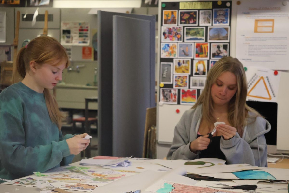 Foundations of Visual Arts students Elise Eddy (’27) and Maddie Kotsen (’27) create a collage as part of the class’s Observing and Responding unit. The course was made a mandatory prerequisite for students who would like to take any other visual arts classes. 