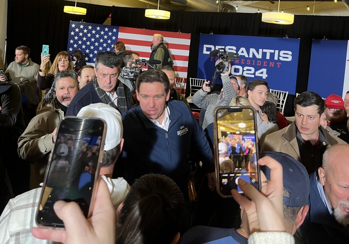 Gov. Ron DeSantis, who was a former Republican candidate, shakes hands with supporters at a rally in Iowa Jan. 14. He dropped out of the presidential race following a dramatic loss to former President Donald Trump in the Iowa caucus.
