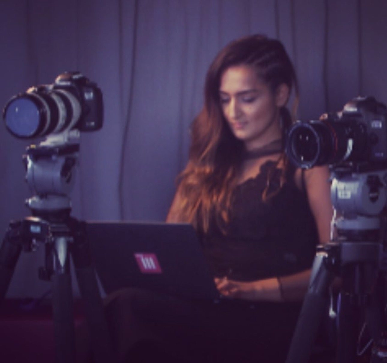 Maleena reviewing footage between two cameras