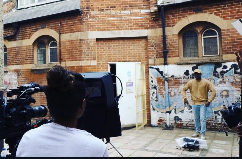 Maleena operating camera on location